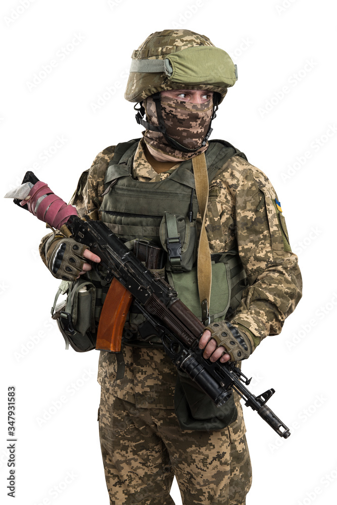 Ukraine officer in mechanized infantry uniform isolated with clipping path on white background. (Flag and arms of Ukraine on the shoulder. Patch on the chest with the inscription Ukraine in Ukrainian) Ukraine officer in mechanized infantry uniform isolated with clipping path on white background. (Flag and arms of Ukraine on the shoulder. Patch on the chest with the inscription Ukraine in Ukrainian)