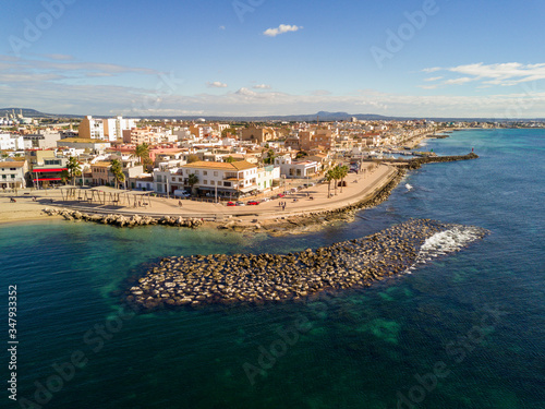 Sunny day in the Marina del Portixol and its promenade.