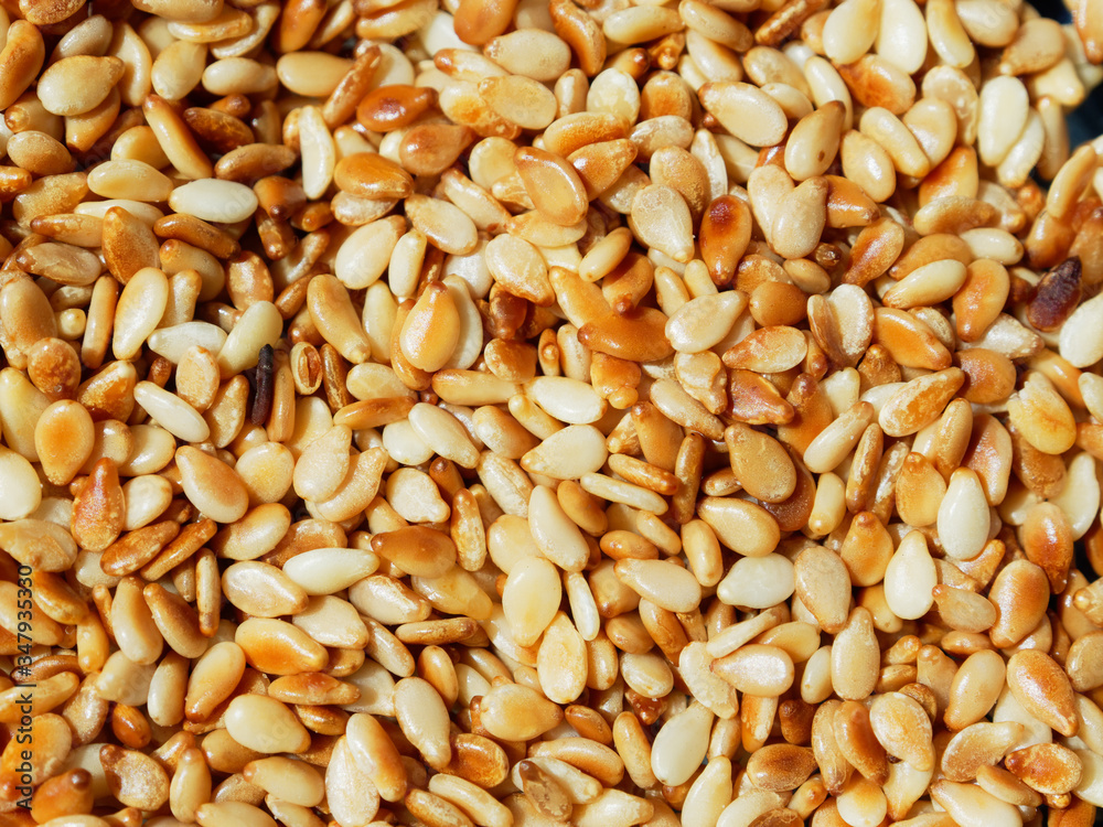 Sesame. Culinary background. Fried sesame seeds close-up.