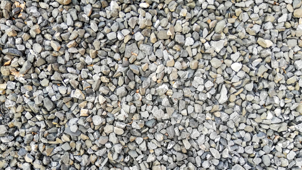texture of gravel stones on ground background texture of gravel stones on ground background