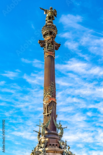 Christopher Columbus Monument in La Rambla, Barcelona, Catalonia in Spain. Tall bronze statue constructed  in honor of his first voyage to the Americas. It serves as a reminder that he reported to Que photo