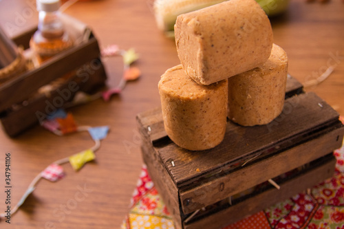 Pacoca, Peanut (type "cork") is a typical Brazilian candy, tipical in Festa Junina Festival. Traditional food of Brazil, June Party sweet. Arraial Rustic Wood Background.