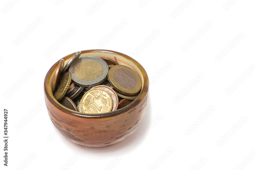 jar of coins isolated on white background