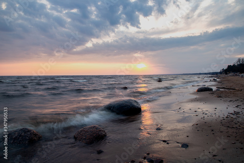 Very beautiful sunset on the beach of the Gulf of Finland