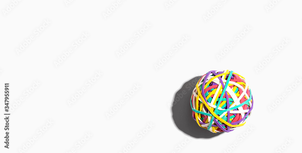 Elastic band ball with drop shadow overhead view - flat lay Elastic band ball with drop shadow overhead view - flat lay