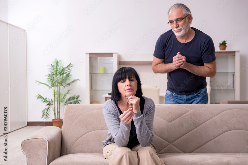 Fototapeta premium Old couple having argument at home
