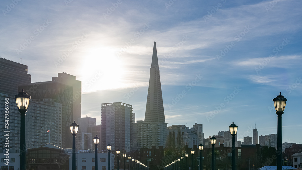San Francisco, the Embarcadero, downtown at sunset, view from the pier, panorama 
