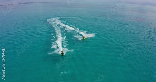 Aerial view of two jet skis in ocean