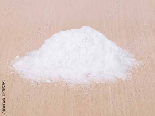 MSM pure powder on wooden plate photo