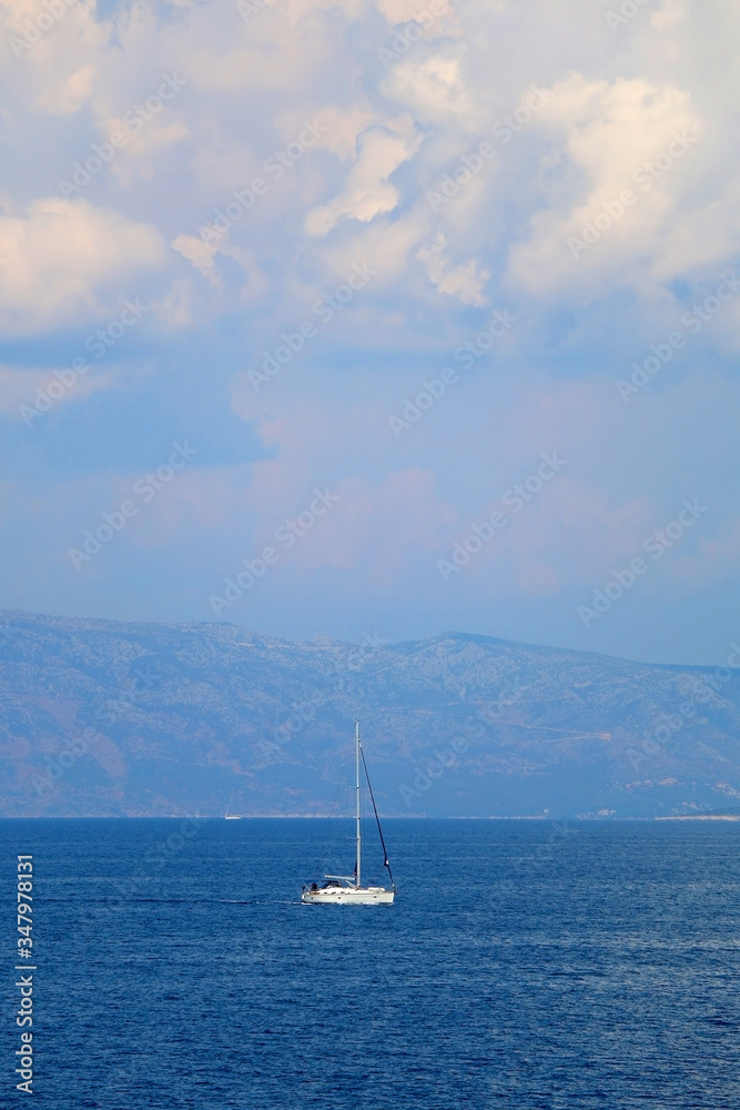 Sailing boat on the sea in southern Dalmatia region in Croatia. Beautiful landscape and bright summer day.