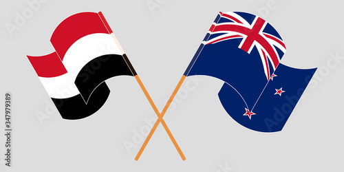 Crossed and waving flags of Yemen and New Zealand photo