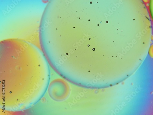 Oil and water macro abstract background with bubbles