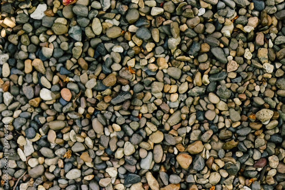 Various pebble stones for background in top view. Various pebble stones for background in top view.