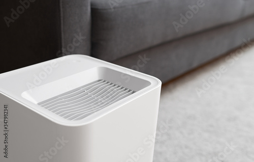 Air purifier in the room. Air washing system. photo