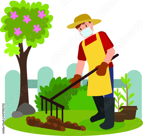 A man digging soil for planting on garden