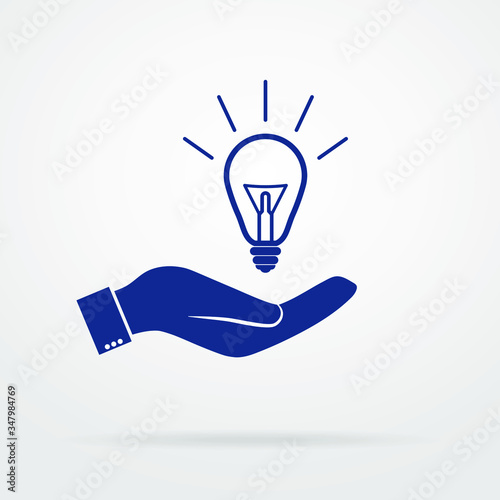 Light bulb in the palm of your hand, vector icon. eps 10