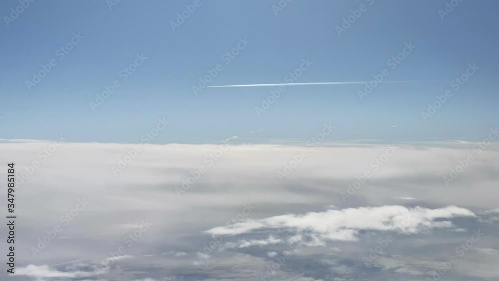 Beautiful clouds and blue sky - view from the airplane window Beautiful clouds and blue sky - view from the airplane window
