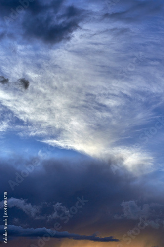 Rain clouds over distant hills at sunset. Zabaykalsky Krai. Russia.