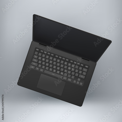 open black laptop on grey