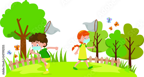 a boy and a girl catching butterfly together outside while using medical mask