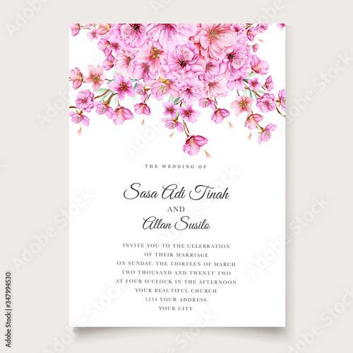 beautiful cherry blossom invitation card template © lukasdedi