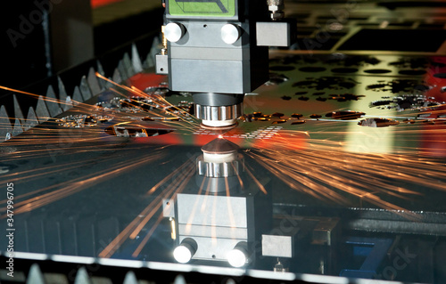 Laser cutting machine for metal in work. photo