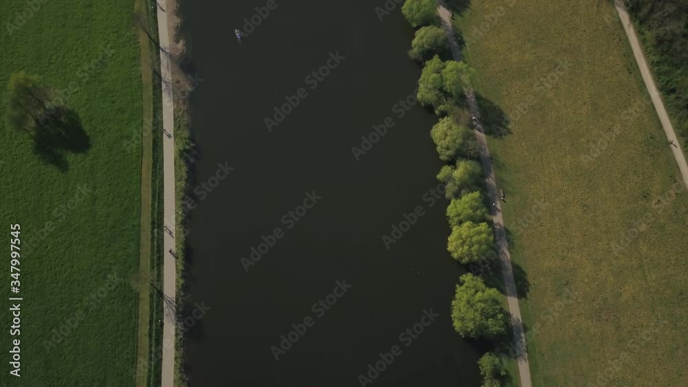 Aerial - Top down view of people doing sport at the Ruhr River, NRW, Germany
Aerial - Top down view of people doing sport at the Ruhr River, NRW, Germany