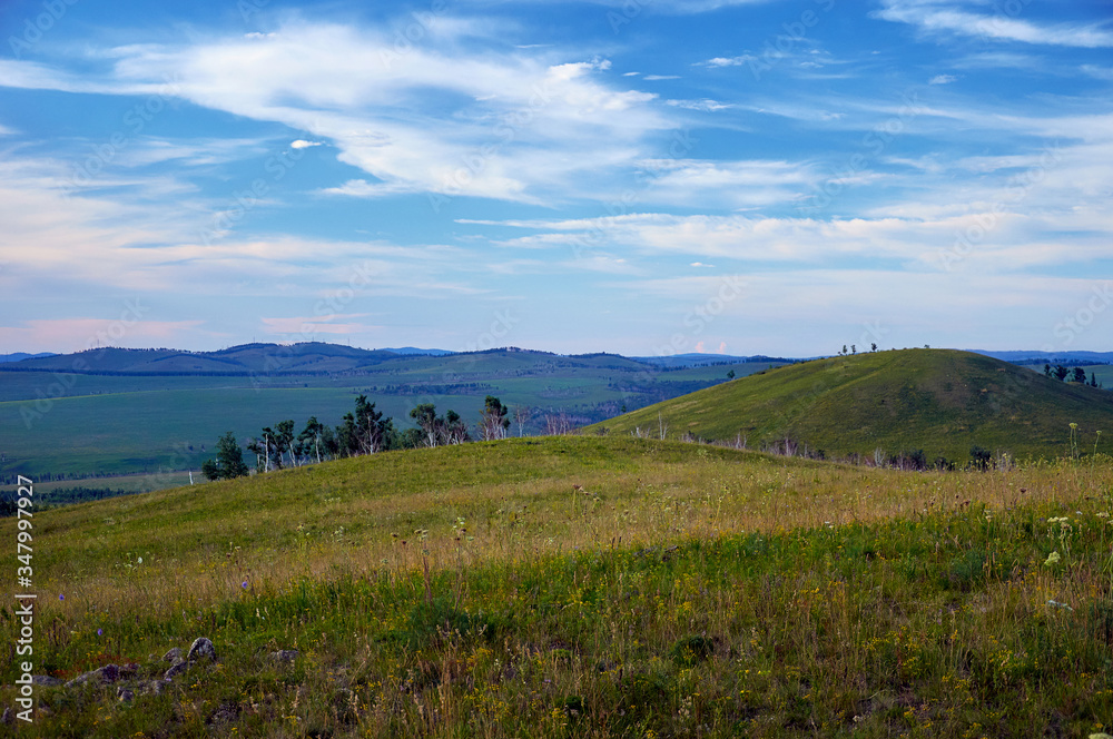 Green steppes and hills on a summer day. Zabaykalsky Krai. Russia.