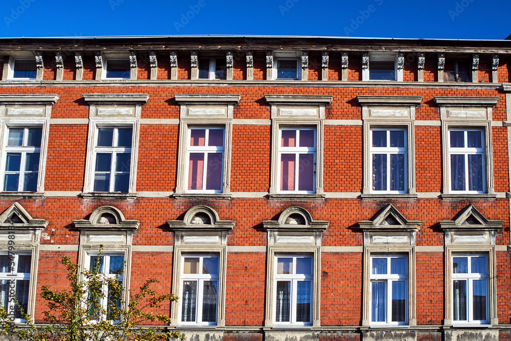 brick  facade of the historic building in Gniezno.