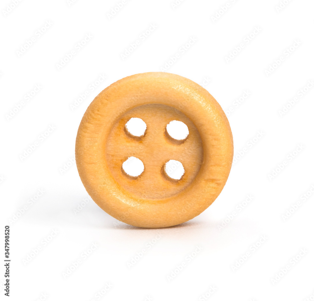 Wooden sewing button isolate on white background Wooden sewing button isolate on white background