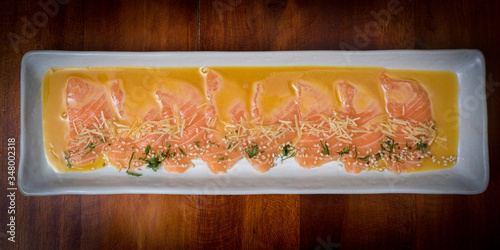 tiradito de salmon - Peruvian dish of raw fish, carpaccio