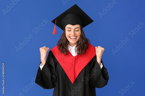 Happy female graduating stu...