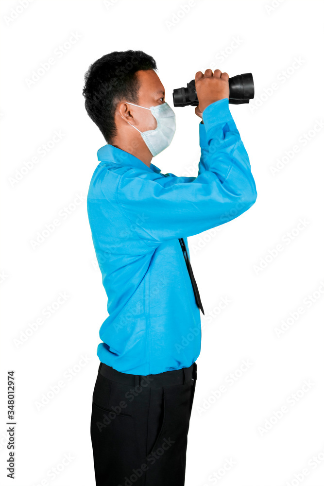 Side portrait of man peeking with his binoculars Side portrait of man peeking with his binoculars