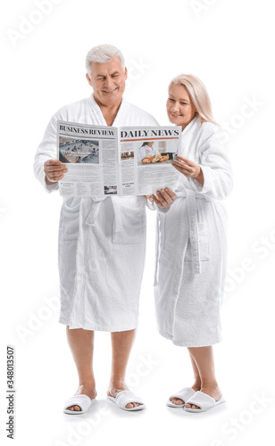 Mature couple in bathrobes ...