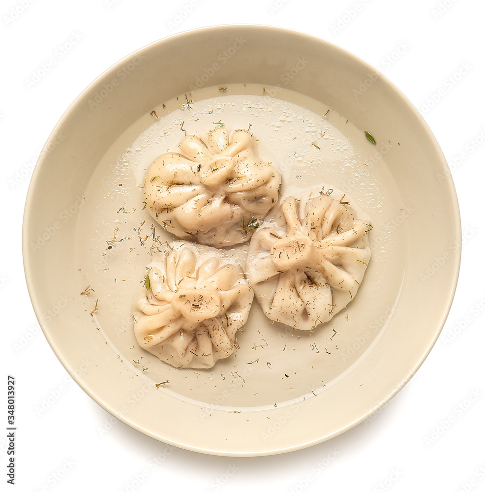 Plate with tasty dumplings on white background Plate with tasty dumplings on white background