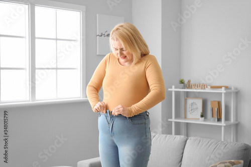 Troubled overweight woman i...