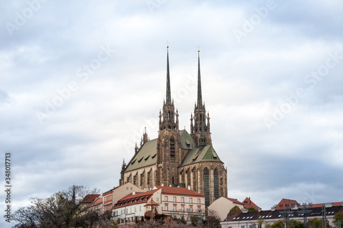 Brno Cathedral of saints peter and paul, seen from the bottom of Petrov Hill, during a cloudy afternoon. Also called katedrala svateho petra a pavla, it is a major landmark of the city of Brno
