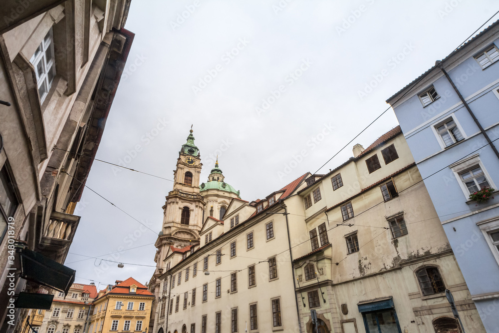 St Nicholas Church, also called Kostel Svateho Mikulase, in Prague, Czech Republic, with its dome seen from Karmelitska street, in the Mala Strana District, in the old town