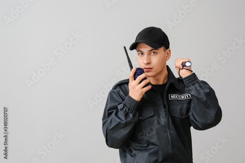 Male security guard with fl...