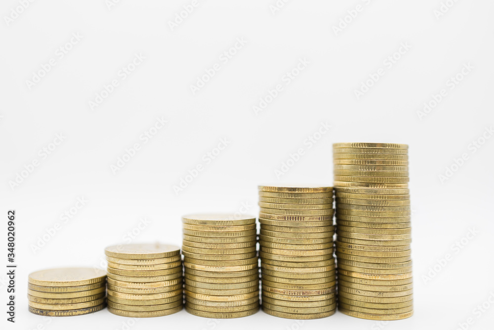 Business, Money, Finance, Security and Saving Concept. Close up of stack of gold coins white background with copy space. Business, Money, Finance, Security and Saving Concept. Close up of stack of gold coins white background with copy space.