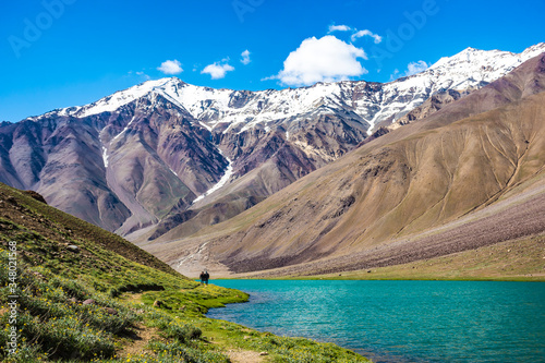 Landscape showing himalayan mountains and the turquoise lake called Chandra Tal, at the Sipti Valley , India.