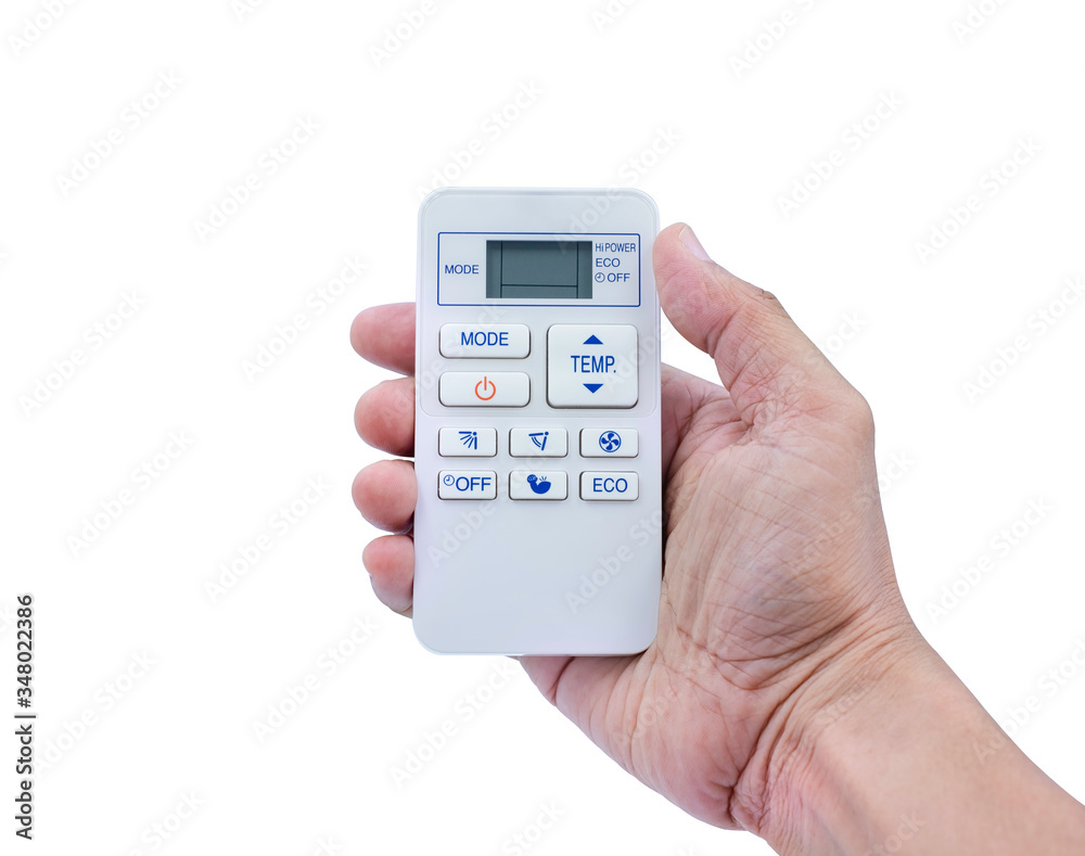 Hand holding remote control of air conditioner isolated on white background with clipping path. Hand holding remote control of air conditioner isolated on white background with clipping path.