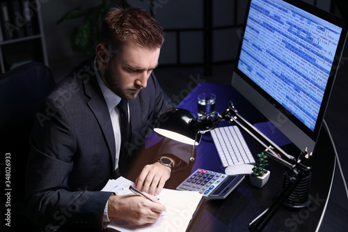 Young businessman working i...