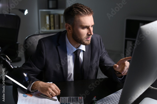 Young businessman working i...