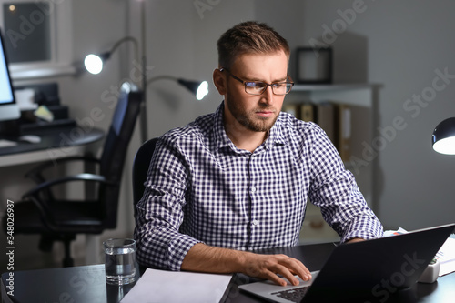 Young businessman working i...