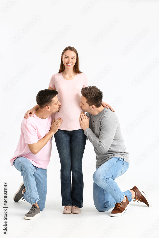 Gay couple with pregnant woman on white background Gay couple with pregnant woman on white background