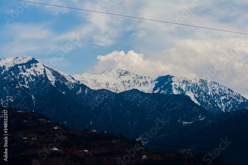 himalayan mountain range covered with the snow at patnitop a city of Jammu, Winter landscape 