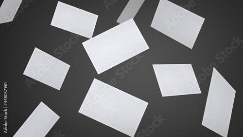 Stack of falling blank white business cards mock-up on grey background. Isolated with clipping path.