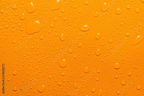 close-up water drop orange background