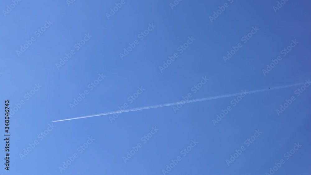 Airplane flying in the blue sky Airplane flying in the blue sky